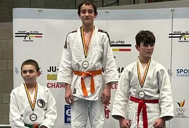 Stef Kempenaers op de 1ste plaats op het podium